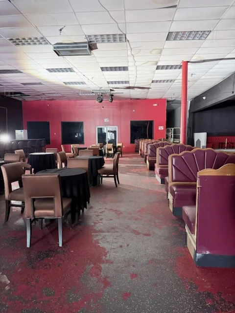 Lounge seating and cleared floor after cleanup